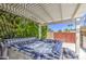 Close-up of a hot tub filled with bubbling water, surrounded by greenery at 2046 E Downing St, Mesa, AZ 85213