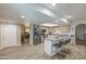 Spacious open-concept kitchen with stainless steel appliances, ample counter space, and center island at 2046 E Downing St, Mesa, AZ 85213