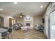 Cozy living room with fireplace, comfortable seating, and tile flooring; perfect for relaxing or entertaining at 2046 E Downing St, Mesa, AZ 85213