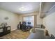 Functional home office with built-in desk, storage, and a large window for natural light at 2046 E Downing St, Mesa, AZ 85213