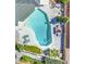Overhead shot of the pool area showing the surrounding landscaping, patio, and lounge chairs at 2046 E Downing St, Mesa, AZ 85213