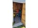 Functional storage shed featuring shelving and tools, providing ample space for storage at 2046 E Downing St, Mesa, AZ 85213
