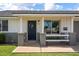 Inviting front porch with decorative wreath and charming accents, offering a warm welcome at 2418 E Hermosa Dr, Tempe, AZ 85282