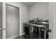 Laundry room features side-by-side washer and dryer units at 2418 E Hermosa Dr, Tempe, AZ 85282
