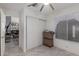 Bright bedroom features sliding closet doors, tile floors, and a window for natural light at 24648 N 40Th Ln, Glendale, AZ 85310