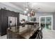 Spacious kitchen features a large island with bar seating, modern appliances, and pendant lighting at 24648 N 40Th Ln, Glendale, AZ 85310