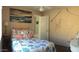 Bedroom featuring coastal themed decor with a painting of a beach at 30178 N Coral Bean Dr, San Tan Valley, AZ 85143
