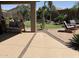 Inviting patio with comfortable seating and lush backyard views, perfect for relaxation and entertainment at 30178 N Coral Bean Dr, San Tan Valley, AZ 85143