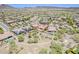 Expansive aerial view of the property highlighting the private pool and lush desert surroundings at 30374 N 124Th Dr, Peoria, AZ 85383