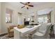 Bright office space featuring a white modern desk and lots of natural light at 30374 N 124Th Dr, Peoria, AZ 85383