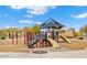 Playground with slides and swings, offering a fun and engaging space for children at 30374 N 124Th Dr, Peoria, AZ 85383