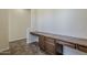 Study features a spacious built-in desk with lots of drawers and electrical outlets at 30374 N 124Th Dr, Peoria, AZ 85383