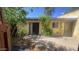 A view of the backyard featuring a covered patio and landscaping at 3404 W Tangerine Ln, Phoenix, AZ 85051