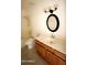 Bathroom featuring tiled floors, standard vanity, medicine cabinet, and shower at 3404 W Tangerine Ln, Phoenix, AZ 85051