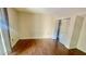 Bedroom featuring gleaming wood floors and ample closet space at 3404 W Tangerine Ln, Phoenix, AZ 85051