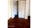 Bedroom closet featuring bi-fold doors and a hanging rack at 3404 W Tangerine Ln, Phoenix, AZ 85051