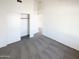 Bedroom with carpet, closet and entrance to another room at 3407 N 67Th Ln, Phoenix, AZ 85033