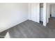 Bedroom with carpet, closet and entrance to another room at 3407 N 67Th Ln, Phoenix, AZ 85033