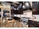 Gourmet kitchen features custom cabinets, stainless steel appliances, and a large island with sink at 36133 N 24Th Ave, Phoenix, AZ 85086