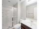 Bathroom with glass enclosed shower, tile flooring, vanity, and sink at 3822 E Amber Ln, Gilbert, AZ 85296