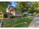 Well-maintained home with landscaped front yard and mature trees, offering a serene neighborhood setting at 3822 E Amber Ln, Gilbert, AZ 85296