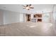 Spacious living room overlooking kitchen with wood flooring, and great natural light at 3822 E Amber Ln, Gilbert, AZ 85296