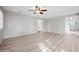 Spacious living room with wood flooring, and great natural light at 3822 E Amber Ln, Gilbert, AZ 85296