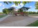 Community playground area under shade canopies at 3822 E Amber Ln, Gilbert, AZ 85296