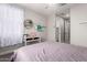 Bright bedroom featuring a desk and stylish flower decor at 3938 E Appaloosa Rd, Gilbert, AZ 85296