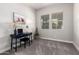 Bright bedroom featuring a desk and two windows providing natural light at 3938 E Appaloosa Rd, Gilbert, AZ 85296