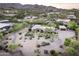 Desert community home featuring palm trees, xeriscaping, and mountain views at 4836 E Moonlight Way, Paradise Valley, AZ 85253