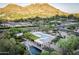 Desert home with solar panels, swimming pool, and mountain views at 4836 E Moonlight Way, Paradise Valley, AZ 85253