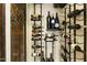 A wine cellar with a metal wine rack storing various bottles of wine at 4836 E Moonlight Way, Paradise Valley, AZ 85253