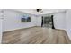 Spacious bedroom with wood flooring, ceiling fan and natural light at 5728 E Sharon Dr, Scottsdale, AZ 85254