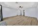Large bedroom features wood floors, ceiling fan, walk-in closet and ensuite bathroom at 5728 E Sharon Dr, Scottsdale, AZ 85254