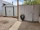 Backyard with a white metal shed and ample space for customization at 61 W Southern Ave # 31, Mesa, AZ 85210