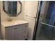 Updated bathroom with modern sink and cabinet with walk-in shower at 61 W Southern Ave # 31, Mesa, AZ 85210