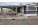 Charming home exterior with covered parking and cozy front porch with a 