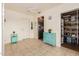 Eat-in kitchen boasts natural light and a charming turquoise accent cabinet at 6160 S Pebble Beach Dr, Chandler, AZ 85249