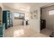 Bright flex room features a built-in desk and adjacent laundry room at 6160 S Pebble Beach Dr, Chandler, AZ 85249