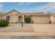 Charming single-story home with well-maintained landscaping and attached two-car garage at 6160 S Pebble Beach Dr, Chandler, AZ 85249
