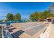 Well-maintained shuffleboard courts with benches and greenery, set in a friendly community at 6160 S Pebble Beach Dr, Chandler, AZ 85249