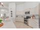 Well-equipped kitchen featuring sleek appliances and ample counter space for food preparation at 725 S Canfield --, Mesa, AZ 85208