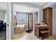 Luxurious primary bath featuring a soaking tub, glass block window, and a separate shower at 8034 E Del Caverna Dr, Scottsdale, AZ 85258
