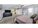 Another angle of this spacious main bedroom boasts neutral colors, walk-in closet, and door to backyard at 8034 E Del Caverna Dr, Scottsdale, AZ 85258