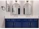 Stylish bathroom featuring double sinks, elegant mirrors, and modern fixtures at 8500 W Saint John Rd, Peoria, AZ 85382