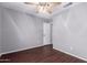 This bedroom features a ceiling fan and neutral colored walls at 8500 W Saint John Rd, Peoria, AZ 85382