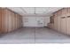 This garage features custom built-in shelving and cabinets for added storage space at 8500 W Saint John Rd, Peoria, AZ 85382
