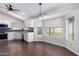 Charming eat-in kitchen with modern appliances, white cabinets, and ample natural light at 8500 W Saint John Rd, Peoria, AZ 85382
