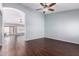 Bright and airy living room with hardwood floors and plenty of natural light at 8500 W Saint John Rd, Peoria, AZ 85382